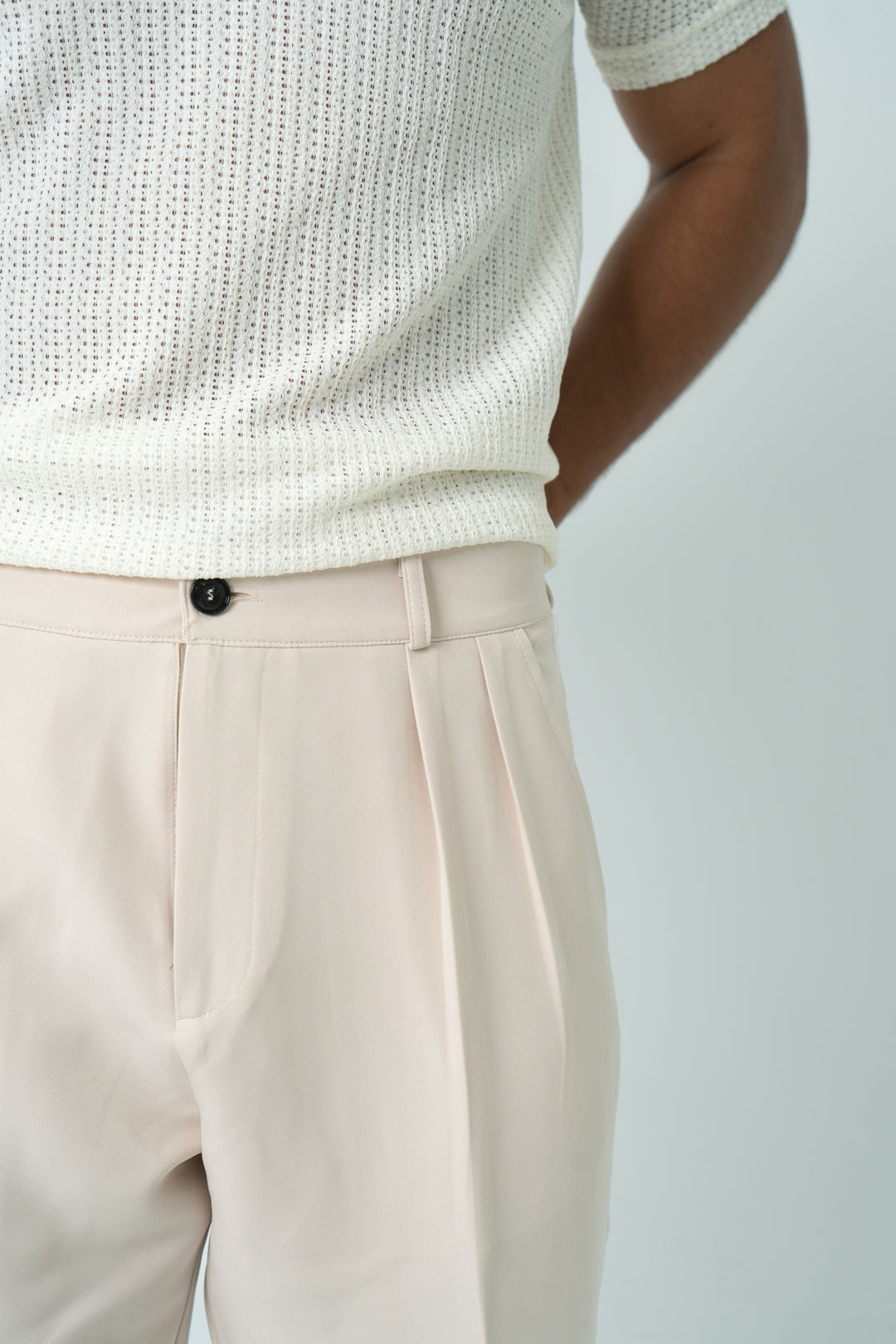 Beige pleated pants